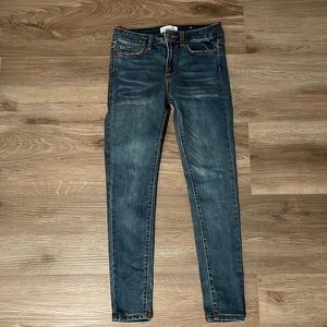 Dark blue, stretch material, skinny jeans, women size 8.